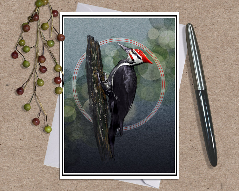 A square art print featuring a detailed illustration of a black and white woodpecker with a red crest, perched on a tree trunk against a dark background with a red circular motif. The print is styled on a kraft paper background with a silver pen on the right and decorative red and green berries on the left.