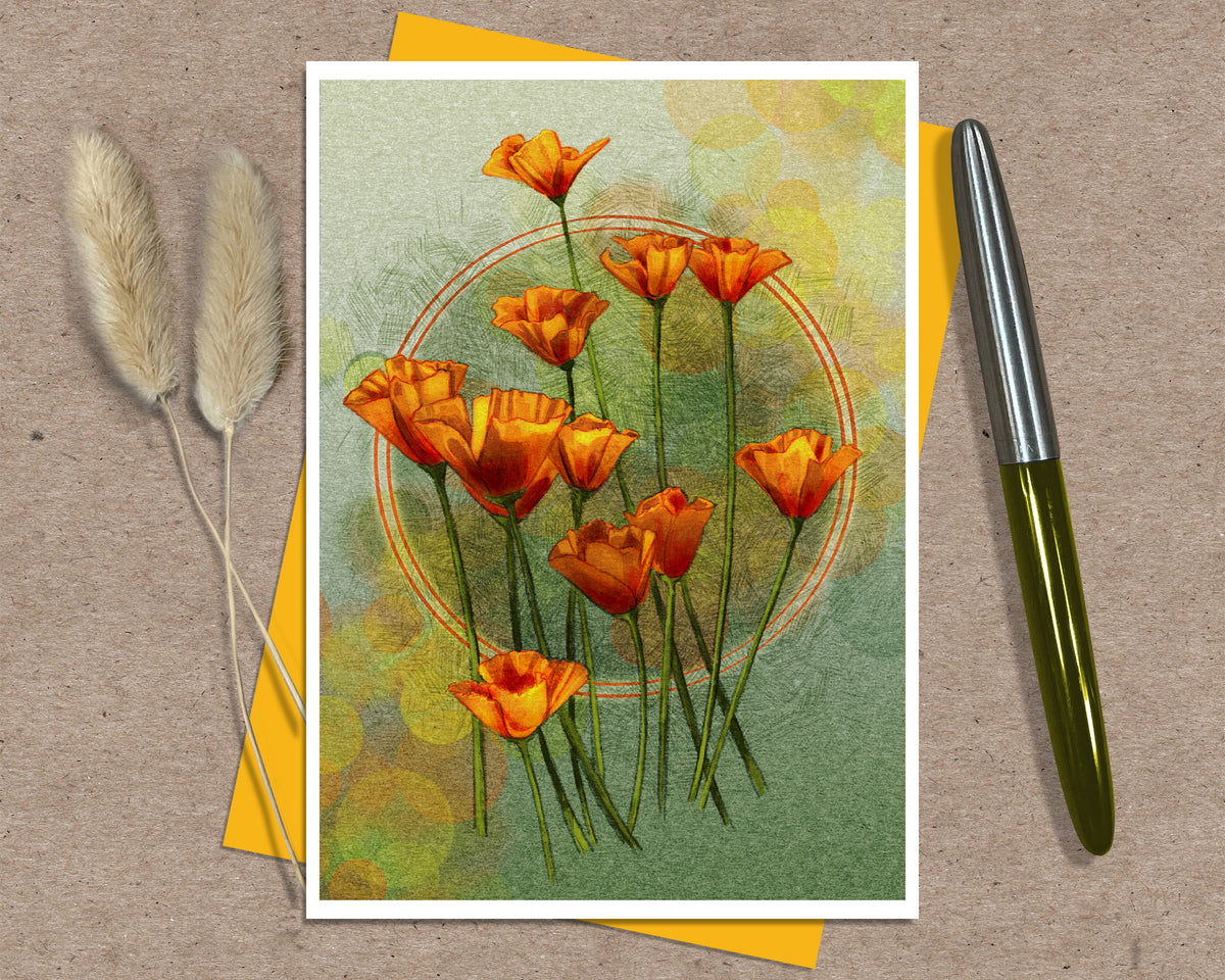 A stylized floral greeting card showing a cluster of orange poppy-like flowers with green stems on a textured pale green background with soft yellow bokeh circles and a faint circular line motif. Posed on a kraft paper background with a yellow envelope.