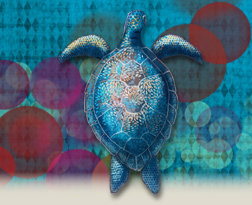 Decorative blue turtle sculpture on a colorful abstract background
