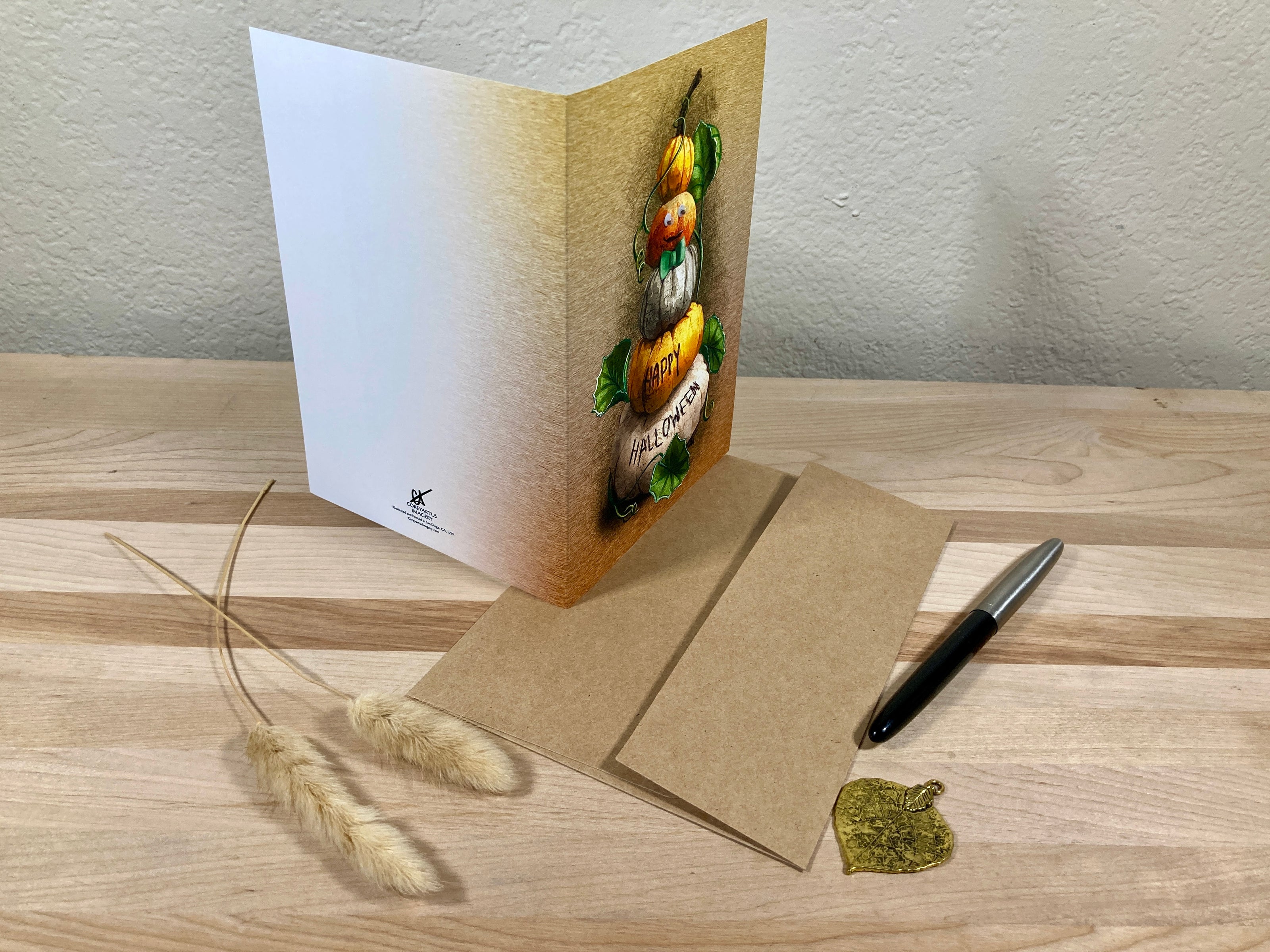 Greeting card with decorative elements on a wooden surface