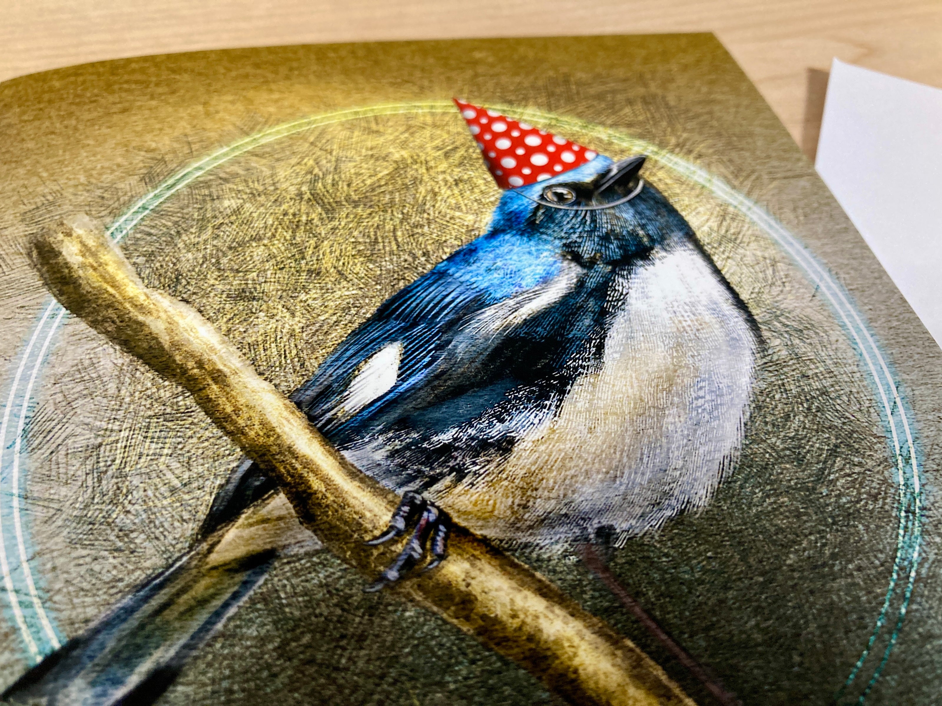 Illustration of a bird wearing a party hat on a textured surface