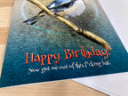 Birthday card with a bird on a branch and humorous text
