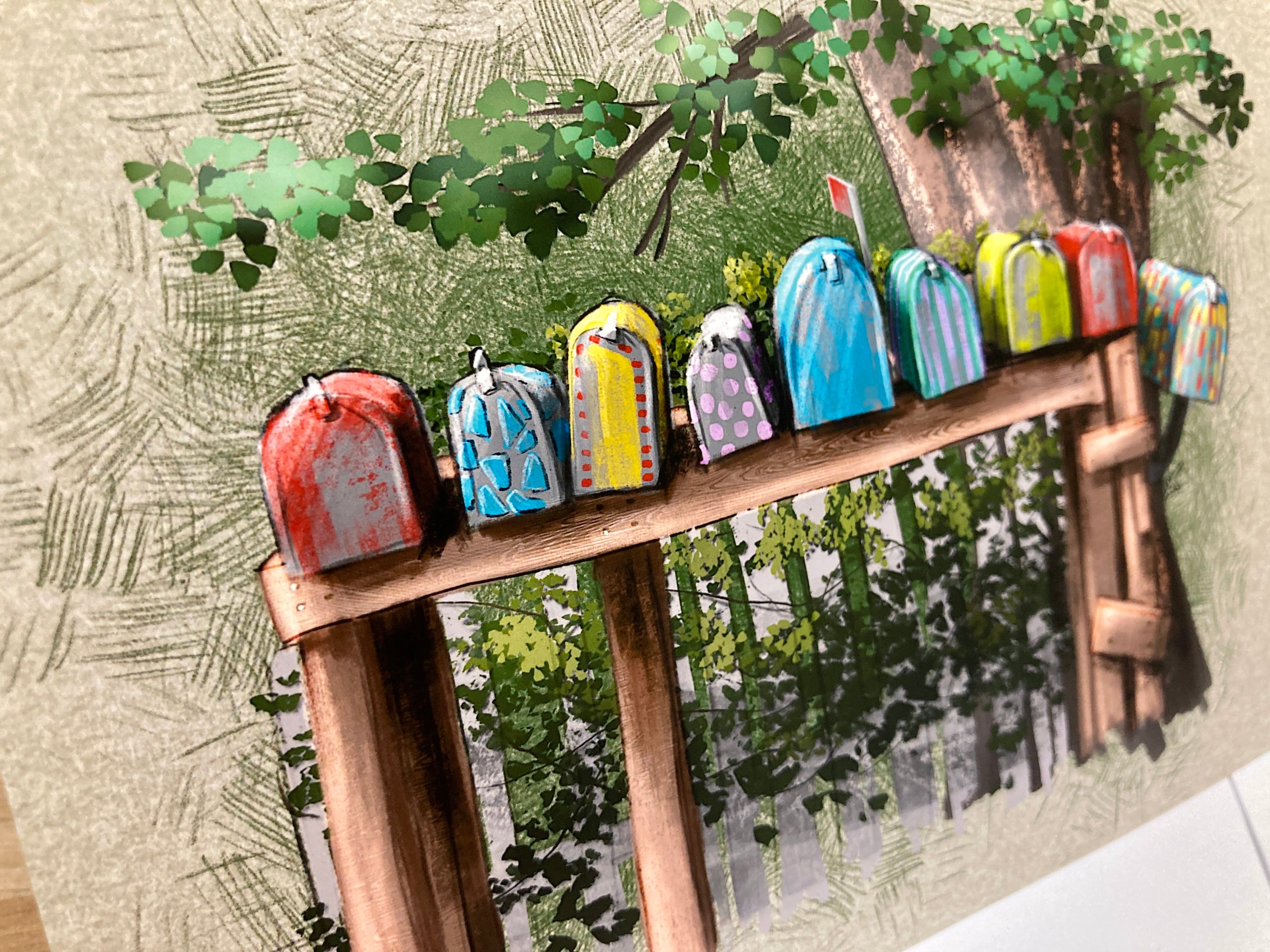 Colorful miniature mailbox set on a wooden stand with a natural background