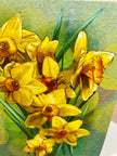 Close-up of yellow flowers with green leaves on a textured background