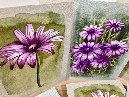 Illustrations of purple flowers on watercolor backgrounds