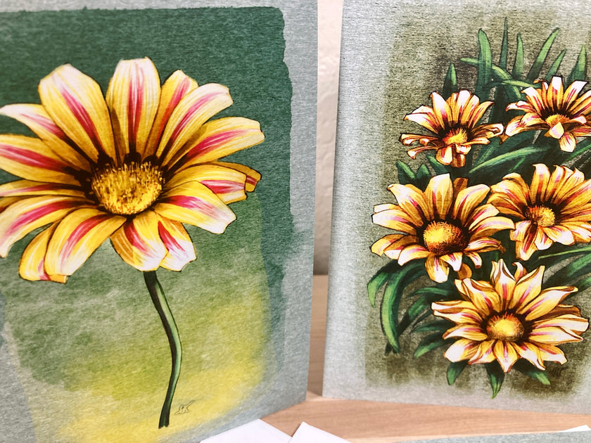 Two floral illustrations of sunflowers on a textured surface.
