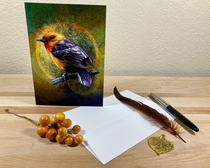 Greeting card with a bird illustration on a wooden surface with berries and a pen.