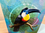 Colorful toucan illustration on a textured background