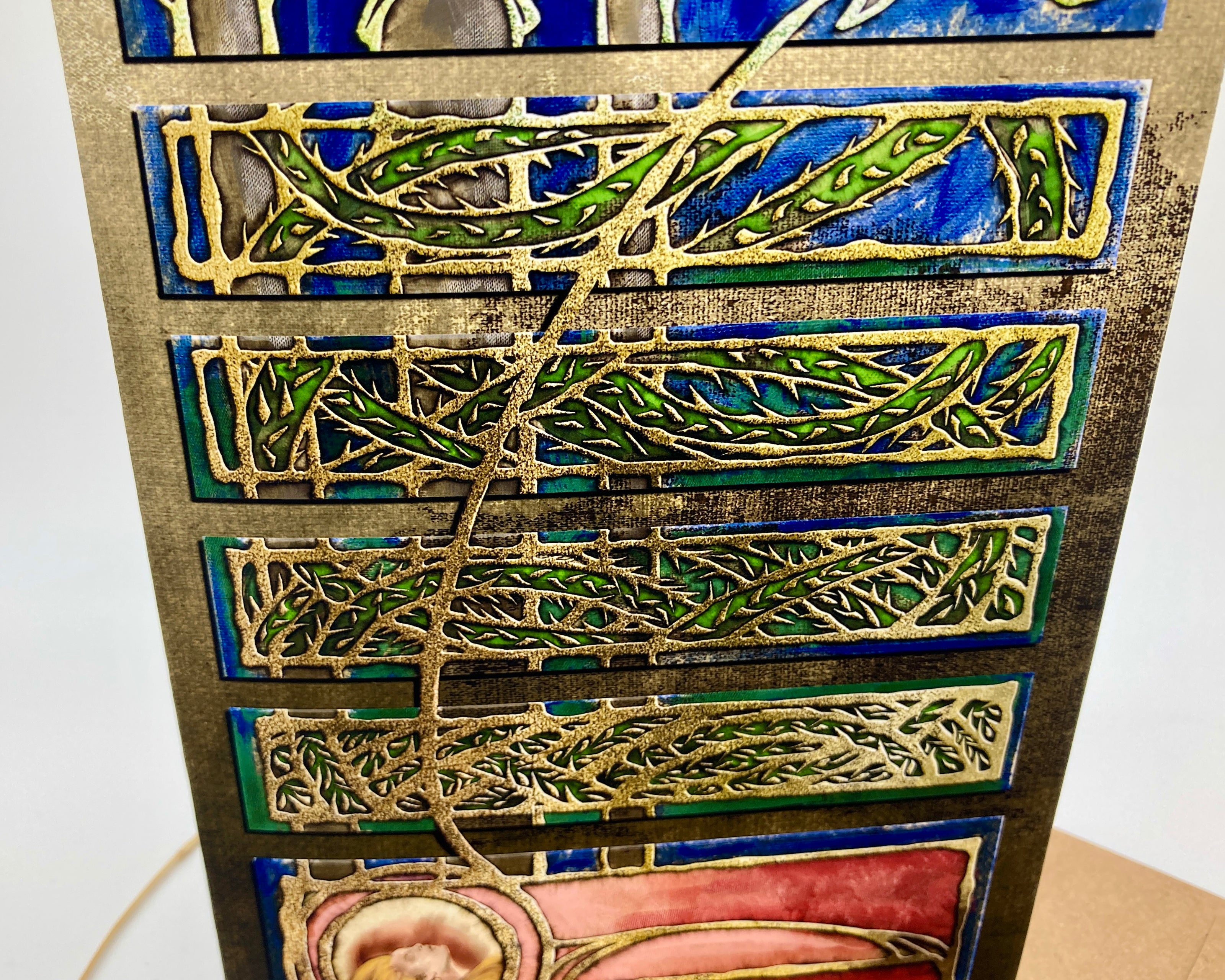 Decorative tile with intricate patterns on a wooden board