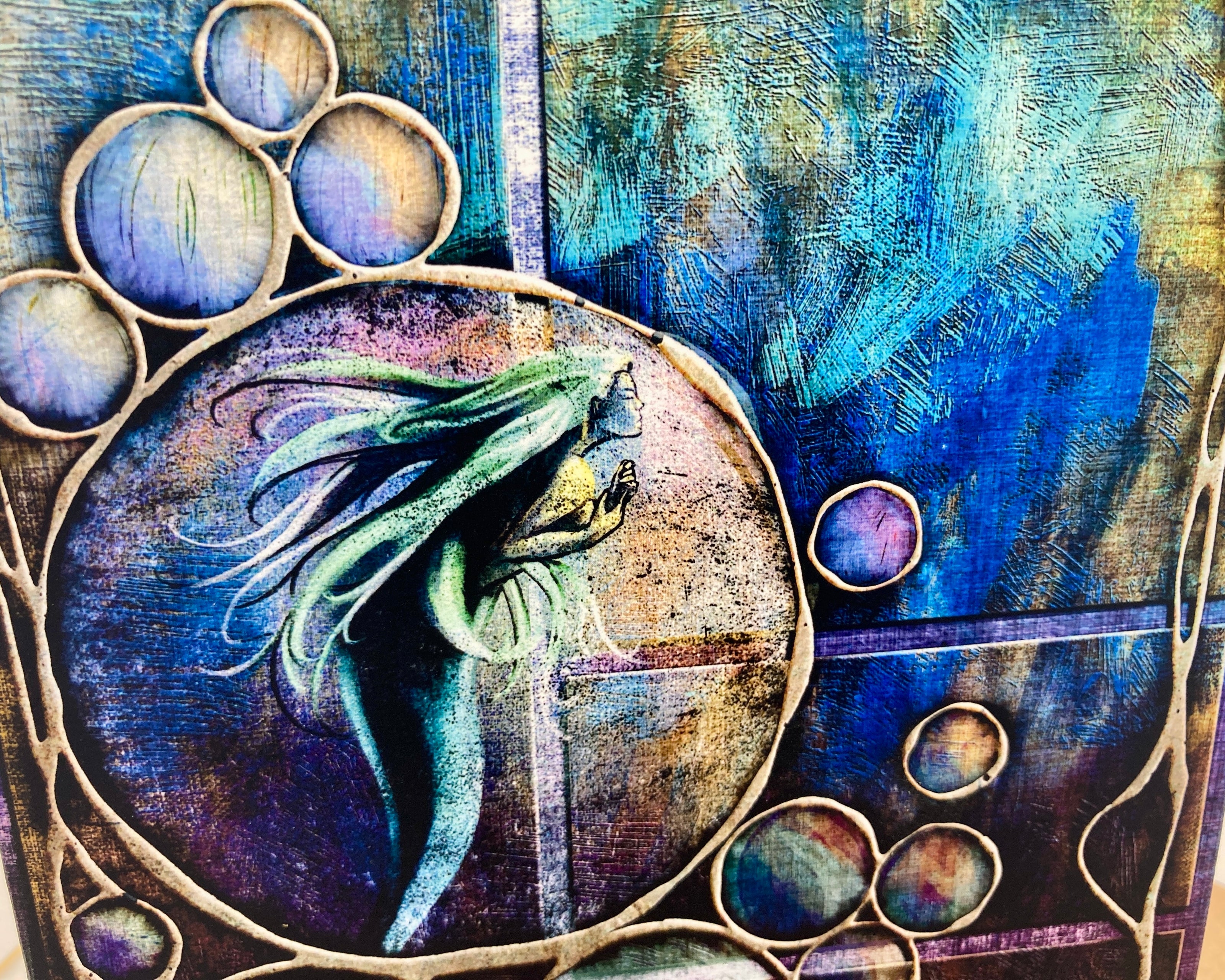 Abstract artwork with a dragon and bubbles on a blue and purple background