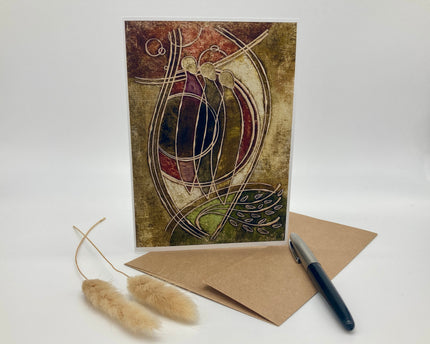 Decorative greeting card with abstract design, brown envelope, and pen on a white background
