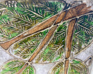 Close-up of a textured surface with leaf-like patterns in brown, green, and white.