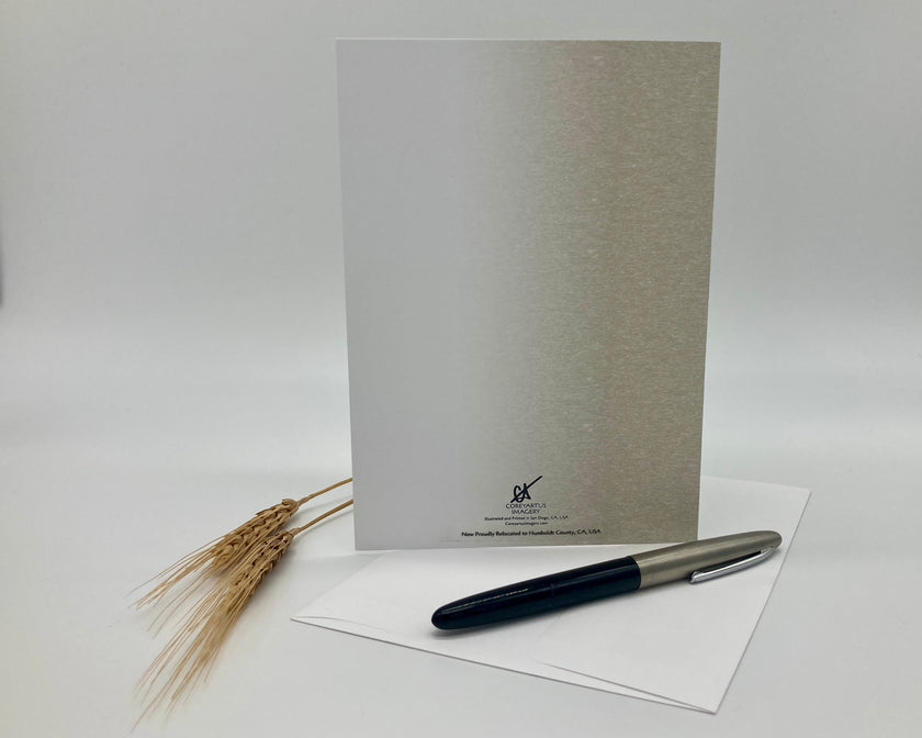 Greeting card with pen and paper on a white background