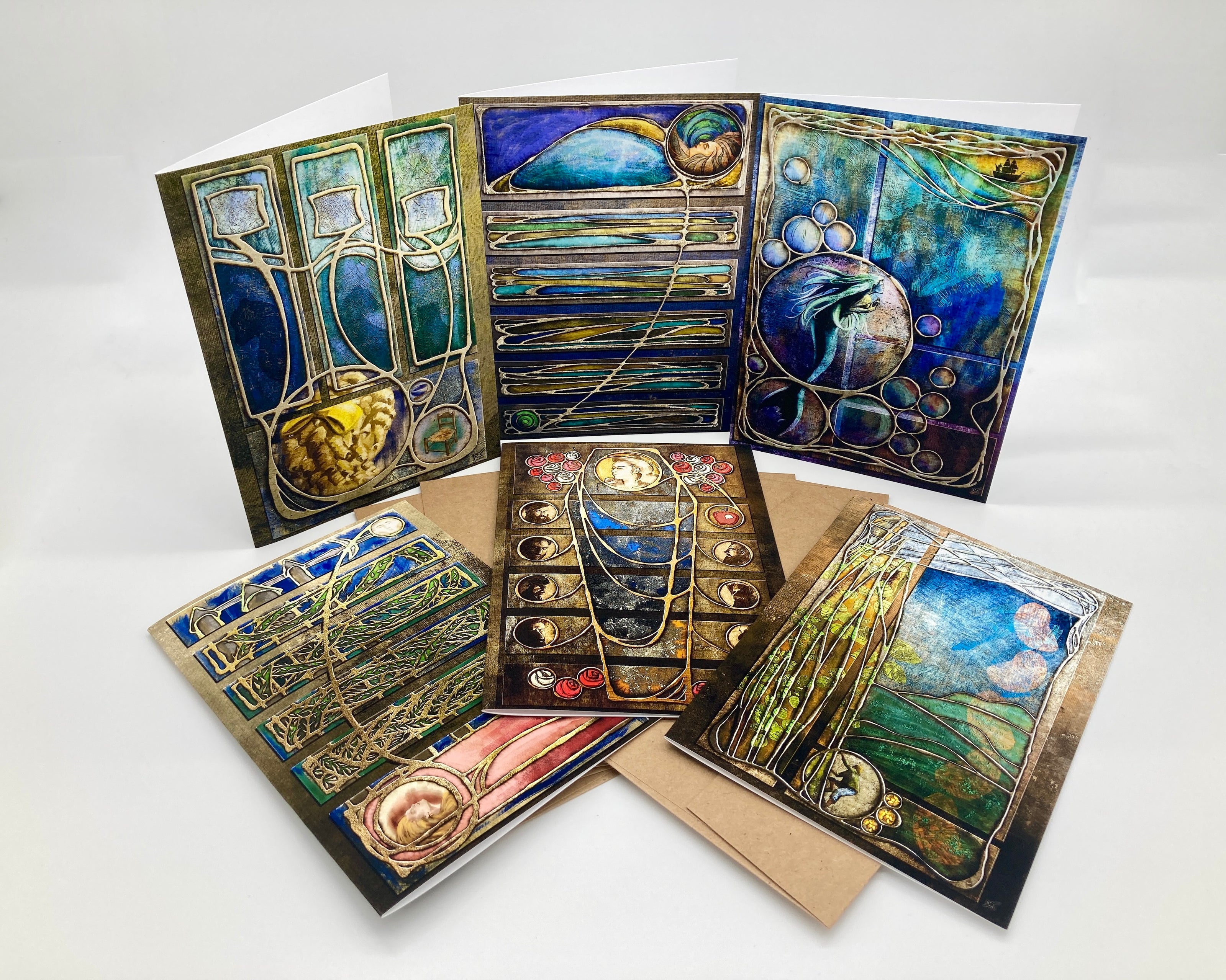 Set of artistic greeting cards with stained glass design on a white background