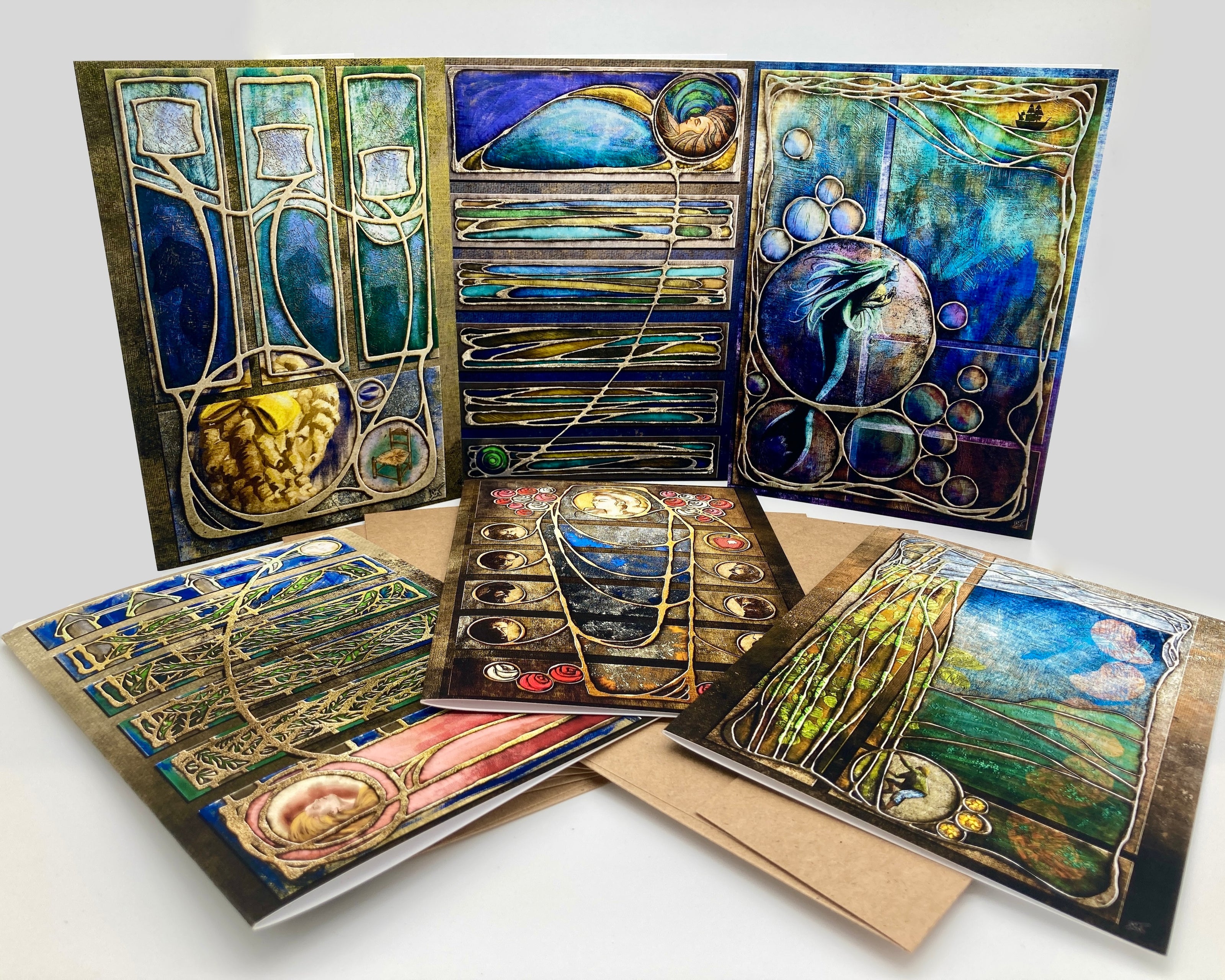 Collection of artistic greeting cards with abstract designs on a white background