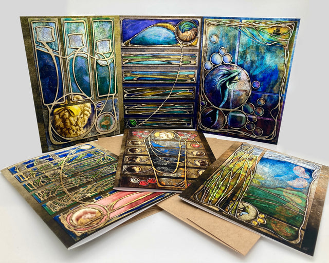 Collection of artistic greeting cards with abstract designs on a white background