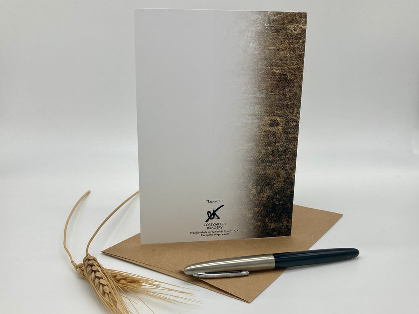 Greeting card with envelope and pen on a white background