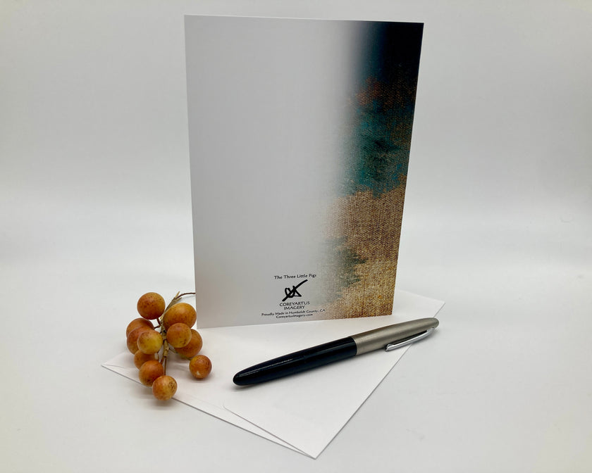 Notebook with a pen and grapes on a white background