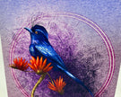 Blue bird perched on orange flowers with a purple circular design in the background