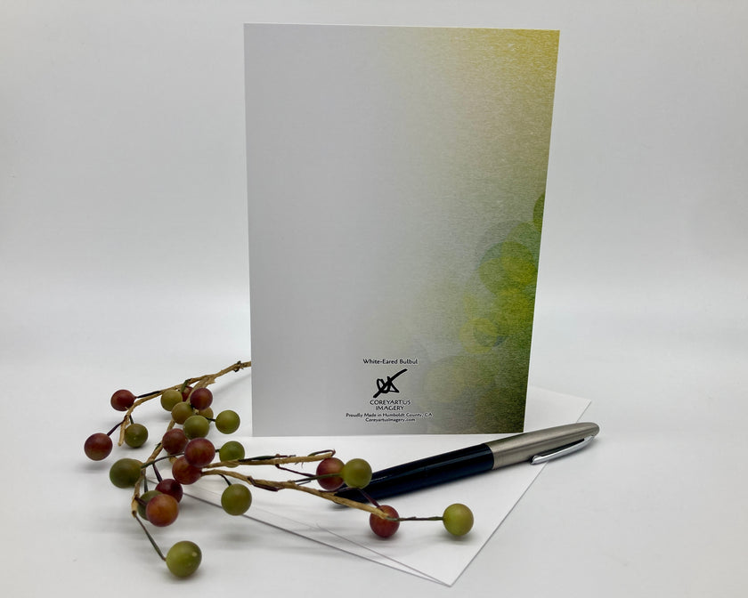 Greeting card with a pen and decorative branches on a white background