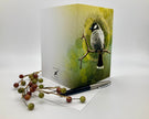 Greeting card with a bird design on a white background