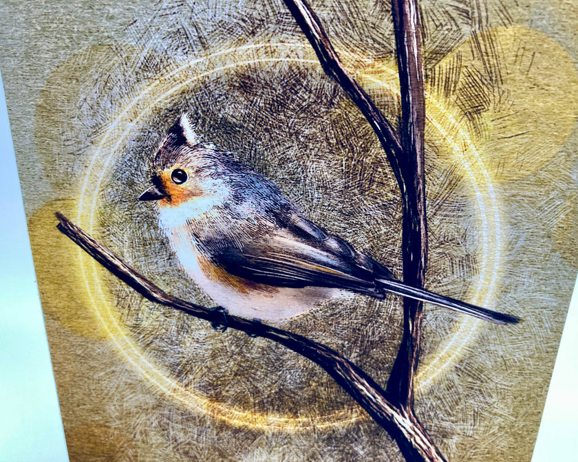 Bird perched on a branch with a wooden background