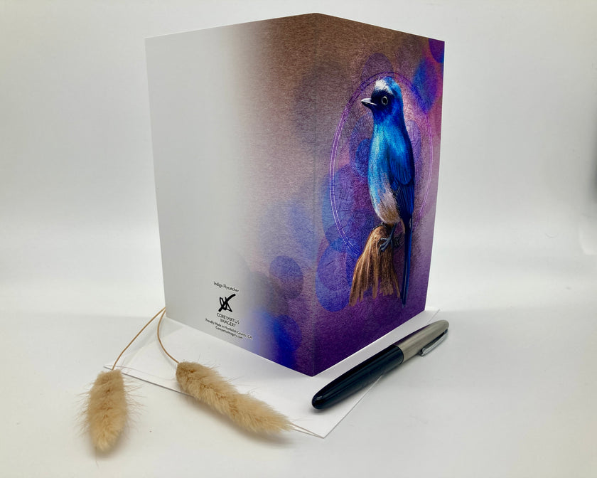 Greeting card with a blue bird design on a white background