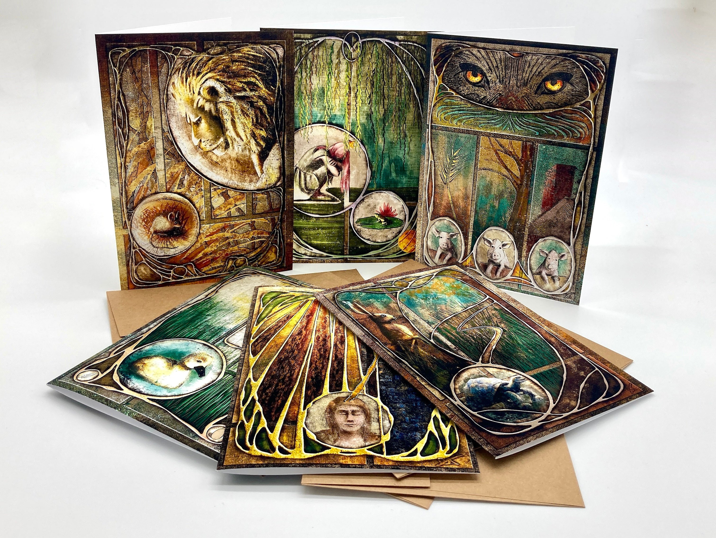 Set of artistic greeting cards with detailed illustrations on a white background