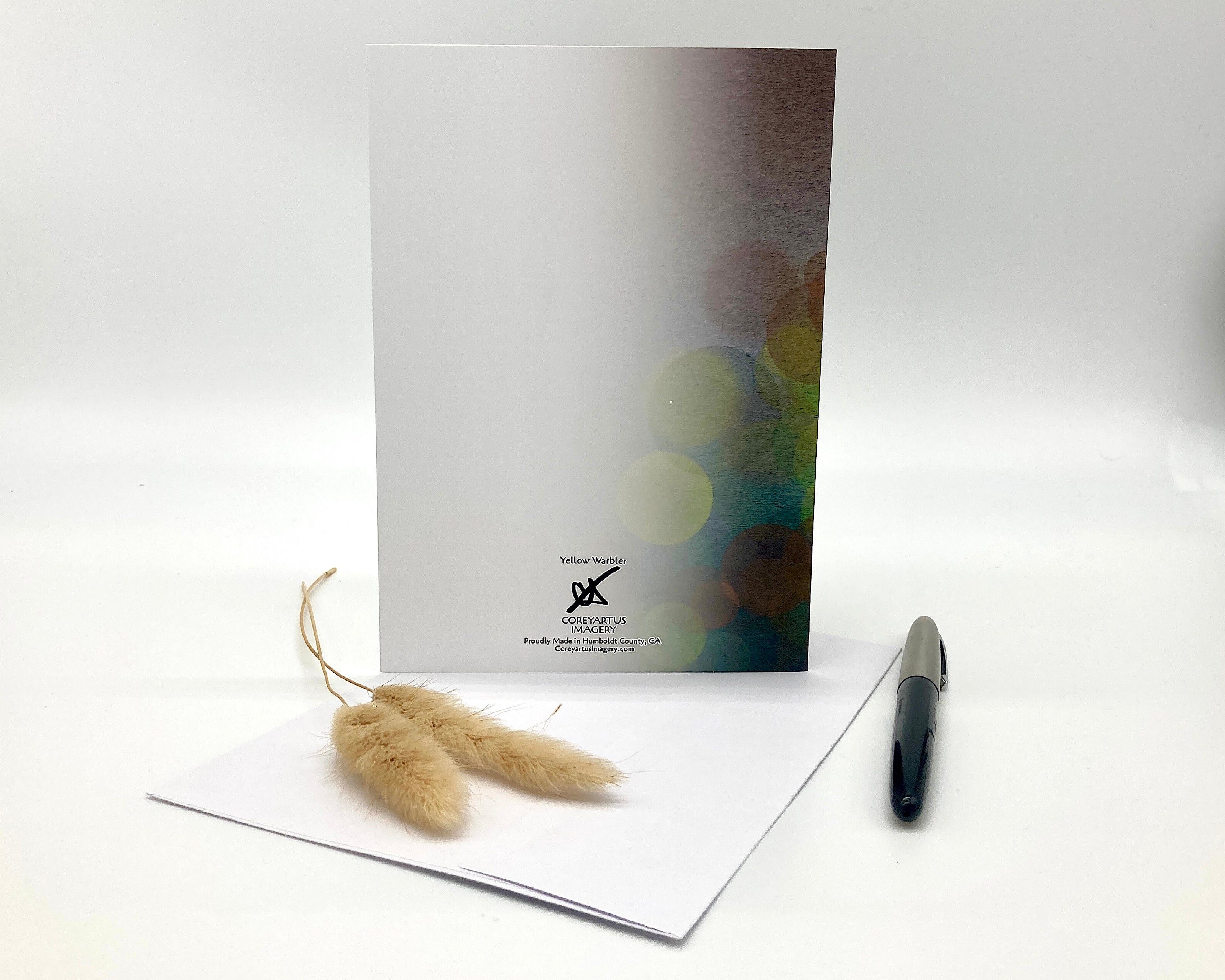 Greeting card with decorative elements on a white surface
