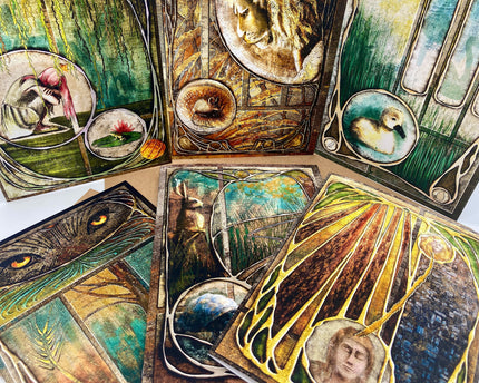 Collection of intricately designed cards with various illustrations on a white background