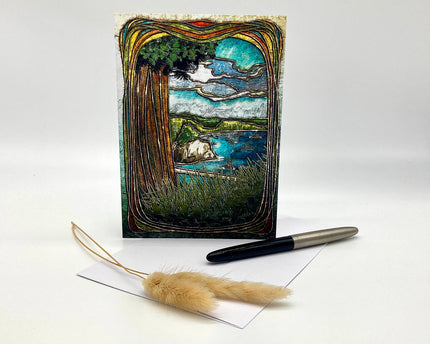 Decorative greeting card with nature-themed illustration, pen, and feather on a white background