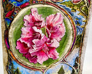 Decorative artwork with pink flowers in a circular frame surrounded by colorful floral patterns.
