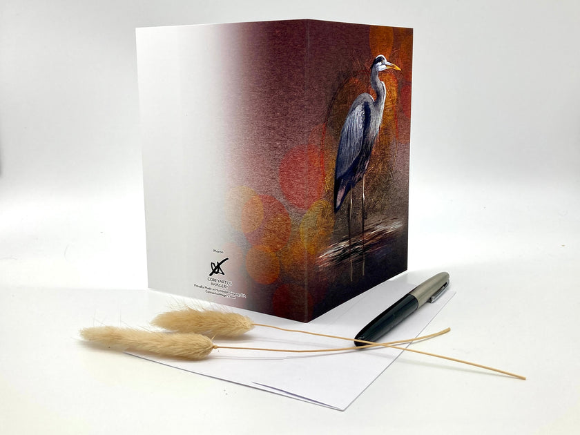 Open greeting card, with a heron design on a white background