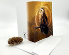Greeting card with owl design on a white background