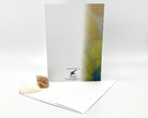 Greeting card with abstract design and envelope on a white background