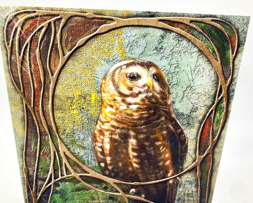 Artistic depiction of an owl surrounded by nature-themed elements