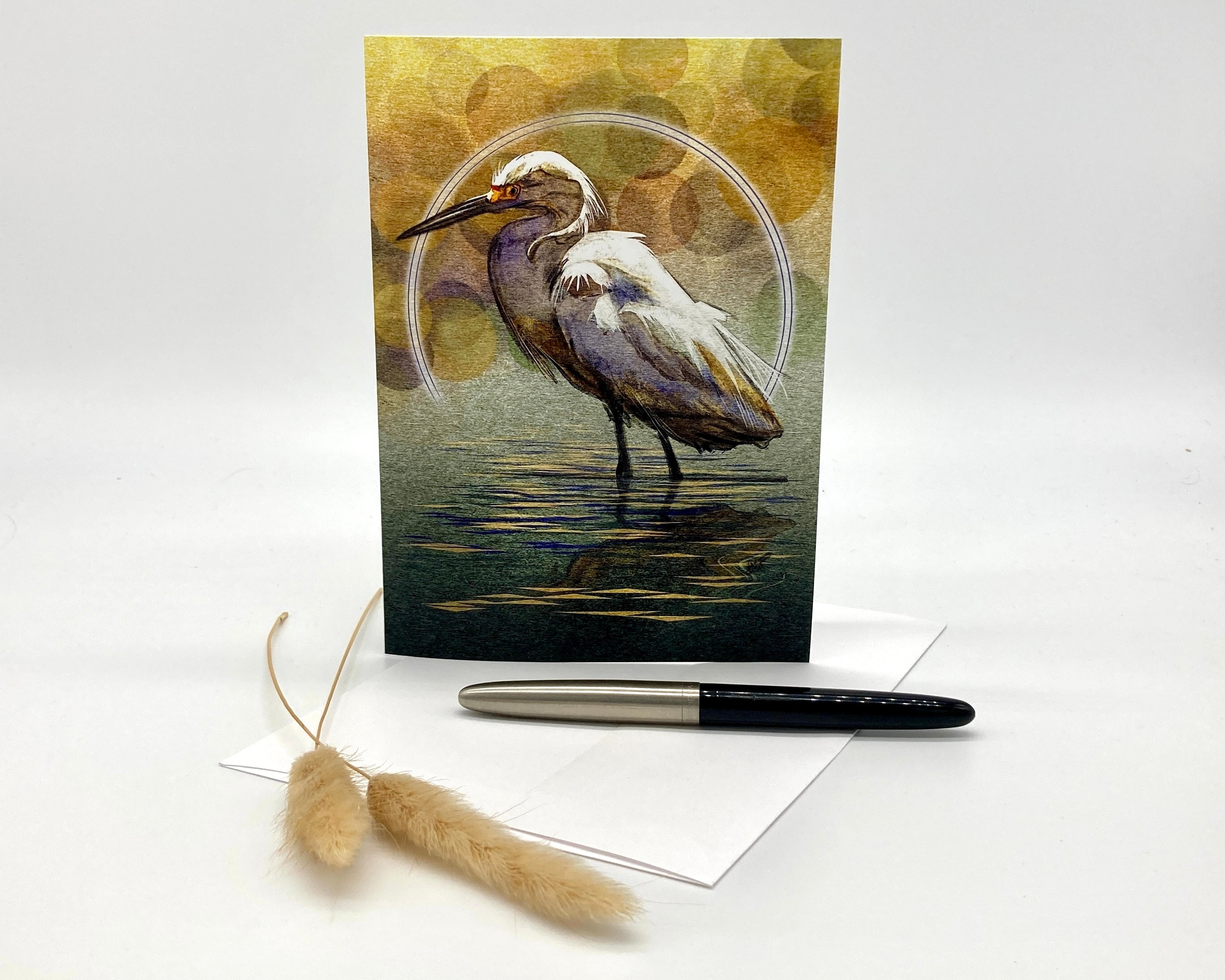 Greeting card with a egret design on a white background