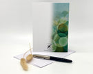 Greeting card with decorative elements on a white background