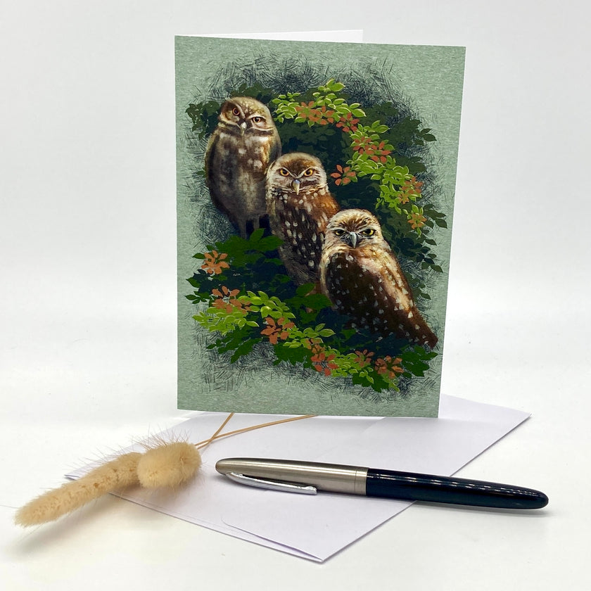 Greeting card with owls design on a white background