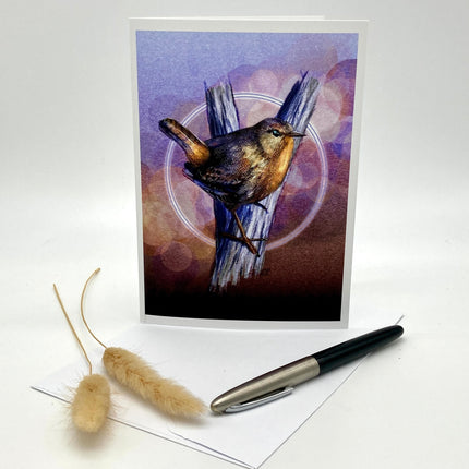 Product photo of a greeting card with a Pacific Wren in browns and purples.