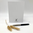 Back side of a greeting card with additional display props.