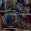 Abstract art with circular shapes and textured surface