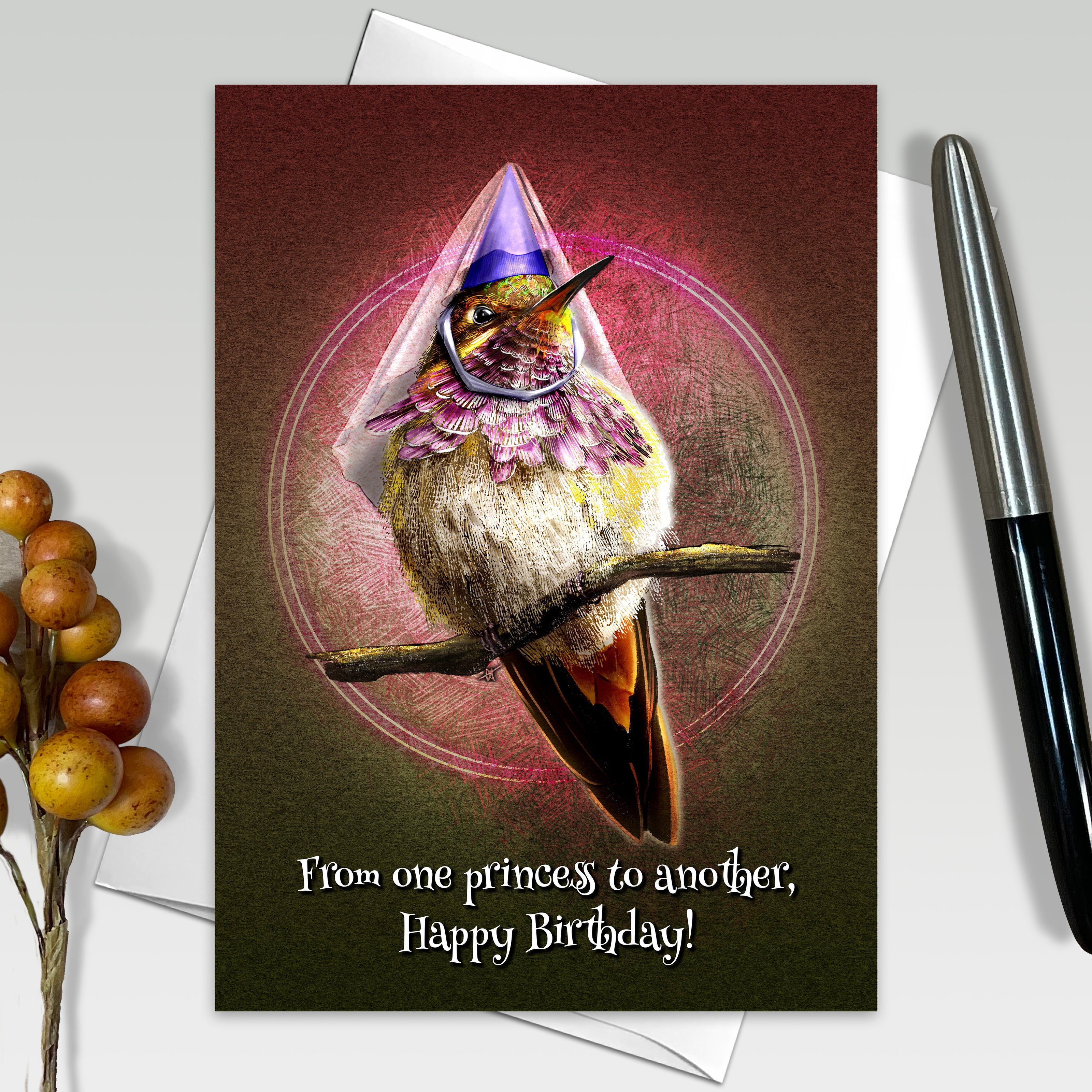 Greeting card with a hummingbird wearing a party hat on a branch, surrounded by decorative elements.