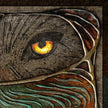 Close-up of a textured surface with an eye-like design and glowing center.