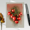 Greeting card with illustration of tomatoes on a textured background