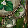 Close-up of leaves and branches with a textured background