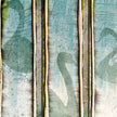 Abstract art with vertical brush strokes in green, blue, and beige.