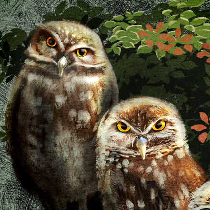 Two owls with yellow eyes and brown feathers sitting among green foliage.