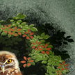 Owl peeking from behind green foliage with red flowers