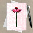Greeting card with a pink flower design on a beige background